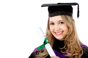 female graduation portrait smiling and holding her diploma